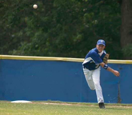Third baseman Daniel Richards fires a throw to first. (Photo by Rick Nation)