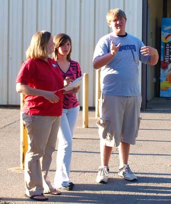 A mother and daughter get directions from a student member of CHAMPs. (Photo by Lana Clifton)