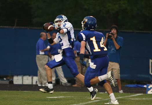 Bryant senior Brandon Parish hauls in a 44-yard touchdown pass. (Photo by Rick Nation)