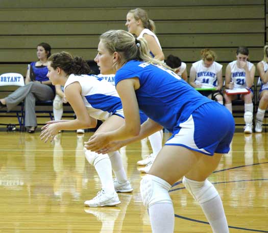 Lauren Reed, foreground, and Kasey Baker set up for serve-receive during Tuesday's match with Van Buren (Photo by Mark Hart)