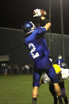 Brandon Parish leaps to catch the game-clinching touchdown in Friday's 21-13 win over Little Rock Catholic. (Photo by Rick Nation)