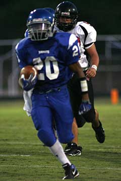 Bryant's Jalen Bell (20) rushed for 136 yards and a touchdown against Searcy. (Photo by Rick Nation)