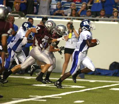 The Benton Panthers spent much of the first quarter chasing Bryant's Chris Rycraw. (Photo by Rick Nation)