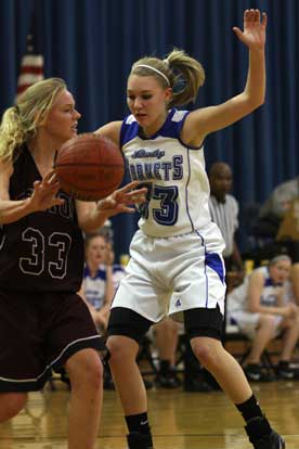 Bryant's Lauren Buck, right, defends Benton's Allison Reynolds during Monday's game. (Photo by Rick Nation)