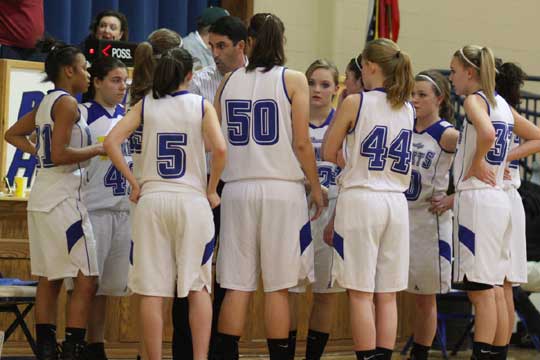 Bryant Lady Hornets freshman coach Eric Andrews instructs his team during a timeout. (Photo by Rick Nation)
