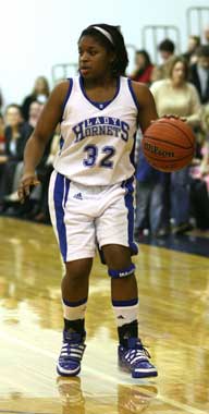 Shanika Johnson led Bryant with 17 points including five 3-pointers Friday night. (Photo by Rick Nation)