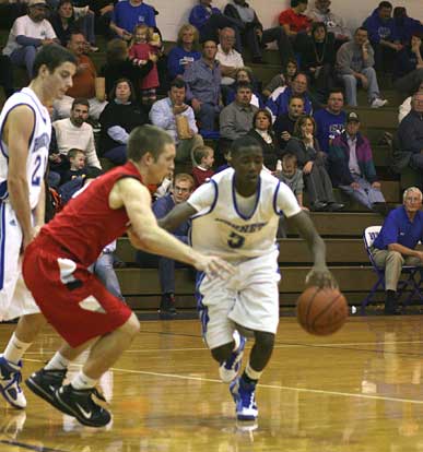 Bryant point guard K-Ron Lairy, 5, tries to work defender Seth Bloomberg off a screen by Kendall Butzlaff. (Photo by Rick Nation)