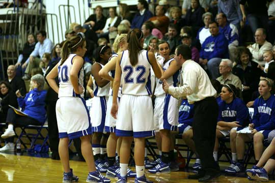 Bryant head coach Blake Condley exhorts his team during a timeout in Friday night's game. (Photo by Rick Nation)