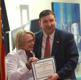State Senator Broadway receives a lifetime chamber membership. (Photo by Lana Clifton)