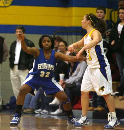 Bryant's Shanika Johnson (32) guards Sheridan's Lauren Sweeten. (PHoto by Rick Nation)