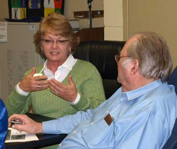 Hurricane Creek Elementary Principal, Wanda Beggs and District Maintenance Supervisor, Bob Padgett discuss the proposed facilities’ plans. (Photo by Lana Clifton)