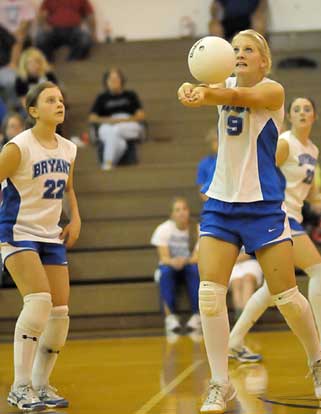 Maggie Hart (9) and Taylor West (22). (Photo by Kevin Nagle)