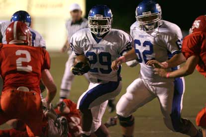 Stephen Clark (29) tries to follow guard Landon Pickett (62). (Photo by Rick Nation)