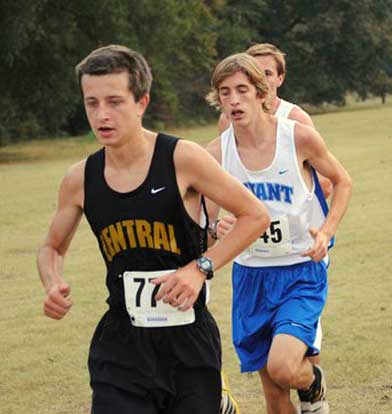 Bryant's Luke Lindsley trails eventual winner Jerry Melnyk of LR Central in Monday's 7A-Central cross country meet. (Photo courtesy of Leann Mercer)