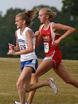 Hannah Raney battles a Cabot runner. 