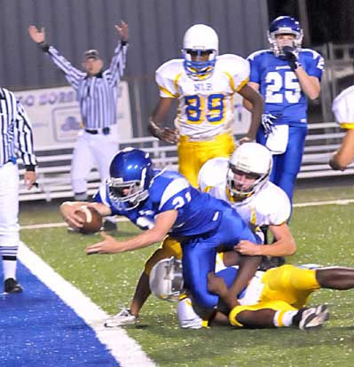 Bryce Denker lunges for the end zone for a Bryant touchdown. (Photo by Kevin Nagle)
