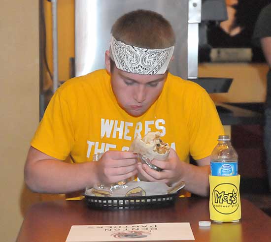 Benton's Tyler Gwatney digs in. (Photo by Kevin Nagle)