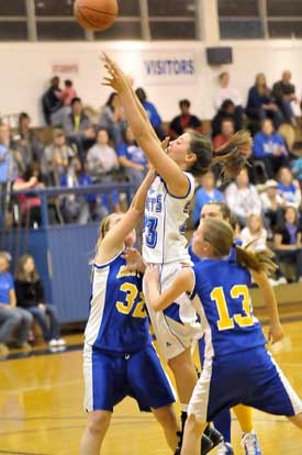 Aubree Allen shoots over a pair of Lakeside defenders. (Photo by Kevin Nagle)