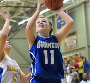 Logan Davis goes to the off hand to get a shot away. (Photo by Kevin Nagle)