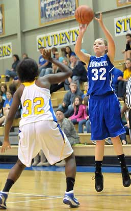 Lauren Buck (32) takes a shot. (Photo by Kevin Nagle)