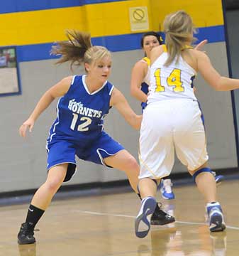 Bryant's McKenzie Rice (12) applies some defensive pressure. (Photo by Kevin Nagle)