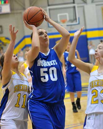 Whitney Meyer goes up for one of her 4 second-half points. (Photo by Kevin Nagle)