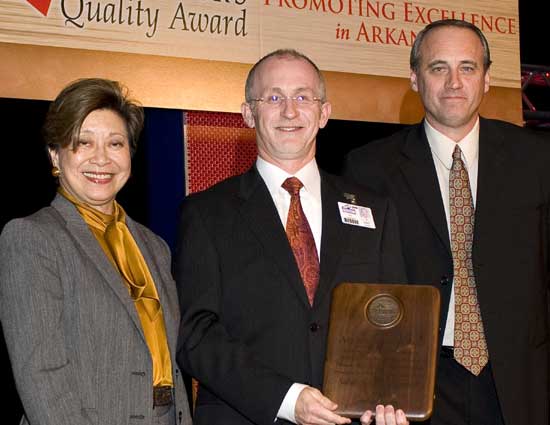 Randy Fortner, SMH President and CEO (center) accepted the Governor’s Quality Award (GQA) for Saline Memorial Hospital (SMH) at the Annual Awards Celebration for the GQA Program on November 15, at the Peabody Hotel in Little Rock. This is the fourth year in a row SMH has been recognized by the respected GQA program that promotes performance excellence. Presenting was Maria Haley (left), Director of the Arkansas Economic Development Commission and Kenny Lloyd (right) with Lockheed Martin Missiles and Fire Control, Camden-a 2006 recipient of the Governor’s Award for Performance Excellence.