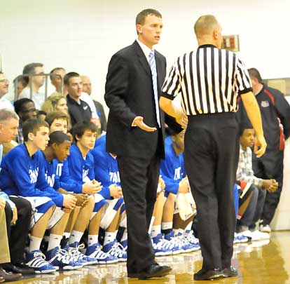 Head coach Mike Abrahamson discusses a call with one of the officials. (Photo by Kevin Nagle)