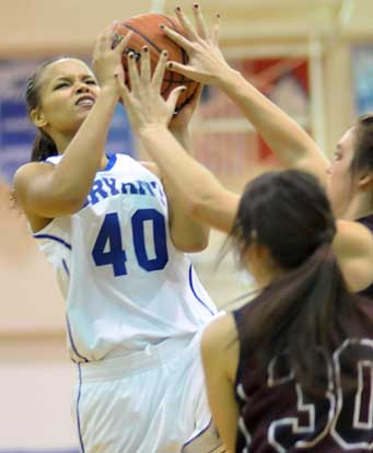 Breanna Blundell fights to get a shot away inside. (Photo by Kevin Nagle)