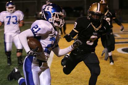Jalen Bell carries in for a touchdown. (Photo by Rick Nation)