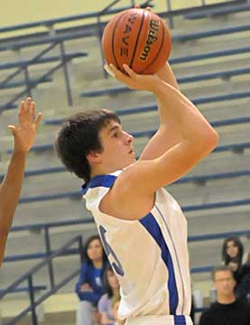 Bryant's Chase Christie puts up a shot during Thursday's game against North Little Rock. (Photo by Kevin Nagle)