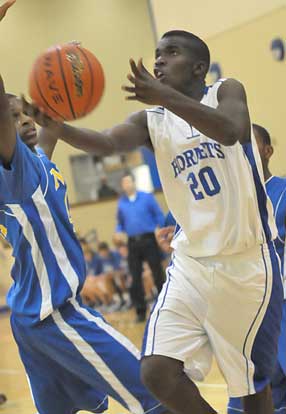 Greyson Giles (20) led the Hornets with 11 points. (Photo by Kevin Nagle)