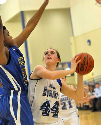 Bryant's Erica Smith (44) looks for room to shoot. (Photo by Kevin Nagle)