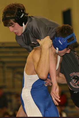 Brandon Powell lifts a Benton wrestler. (Photo by Rick Nation)