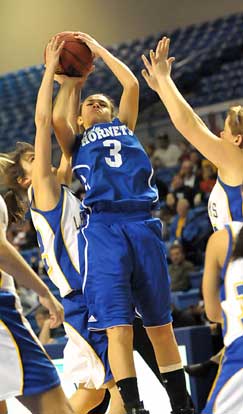 Bryant's McKenzie Adams (3) shoots in traffic. (Photo by Kevin Nagle)