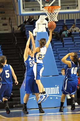 Whitney Meyer (50) defends against Lakeside's Keri Manning. (Photo by Kevin Nagle)