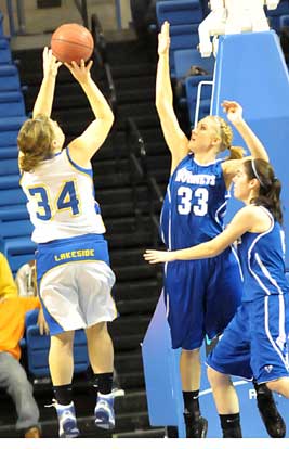 Lakeside's Megan Wylie (34) tries to get a shot over Bryant's Abbi Stearns (33) and London Abernathy. (PHoto by Kevin Nagle)