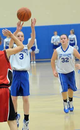 Bryant's Nikki Clay (3) and Jamie Jamison (32). (Photo by Kevin Nagle)