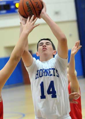 Devin Howard launches a shot. (Photo by Kevin Nagle)