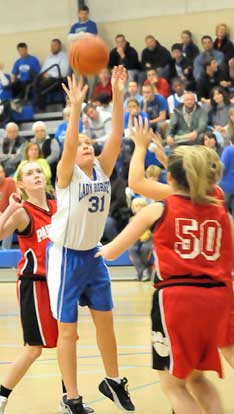Bryant Blue's Rylee Phillips (31) puts up a shot. (Photo by Kevin Nagle)