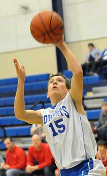 Brandon Warner takes it to the rack. (Photo by Kevin Nagle)