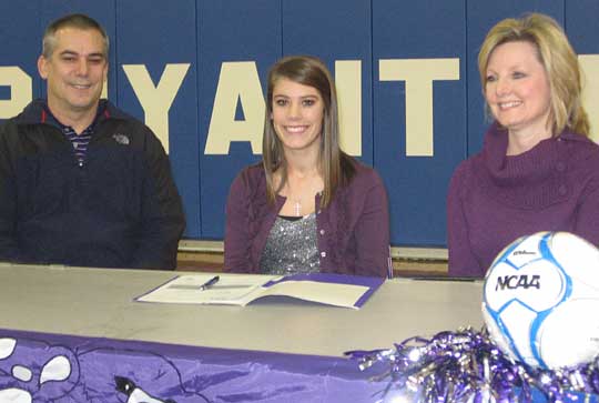 Haley Montgomery, flanked by her parents, signed a letter of intent Wednesday to attend UCA under a soccer scholarship.