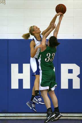 Bryant's Abbi Stearns blocks a shot by Van Buren's Mallory Brown. (Photo by Rick Nation)