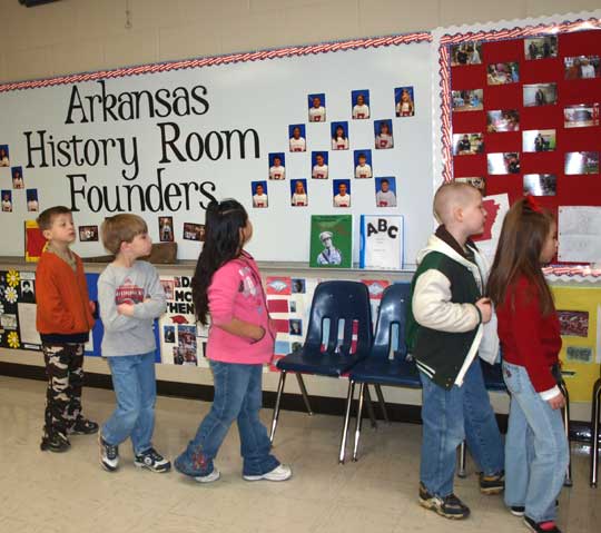 Students tour the Arkansas History Room.