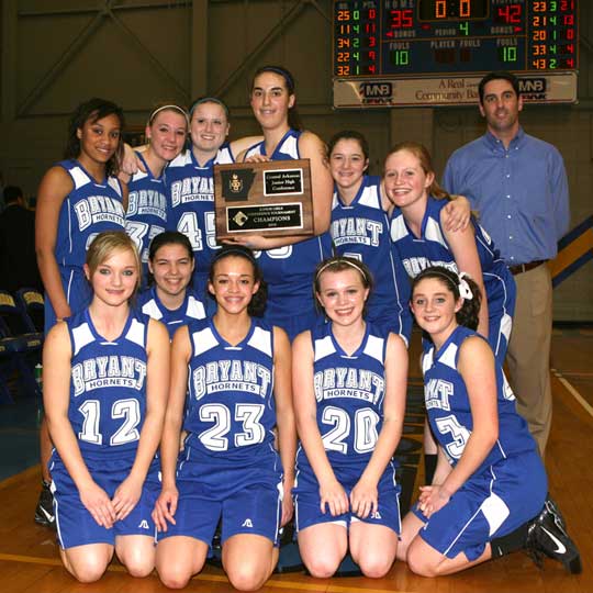 The undefeated Central Arkansas Junior High Conference champion Bryant Lady Hornets, kneeling from left, McKenzie Rice, Kim Henderson, McKenzie Adams, Logan Davis, Courtney Davidson; standing from left, Kiara Moore, Lauren Buck, Hayley Murphy, Whitney Meyer, Skylar Combs, Kristen Scarlett and head coach Eric Andrews. (Photo by Rick Nation)