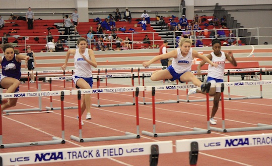 Morgan Seelinger, front right, on her way to a state record.  Trailing (left) is Jordan Chadwick who finished eighth. (Photo courtesy of Carla Thomas)