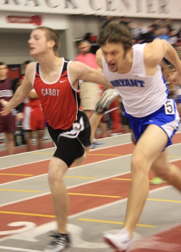 Stanley Oxner and a Cabot runner leaning at the finish of the 400 meter dash. (Photo courtesy of Carla Thomas)