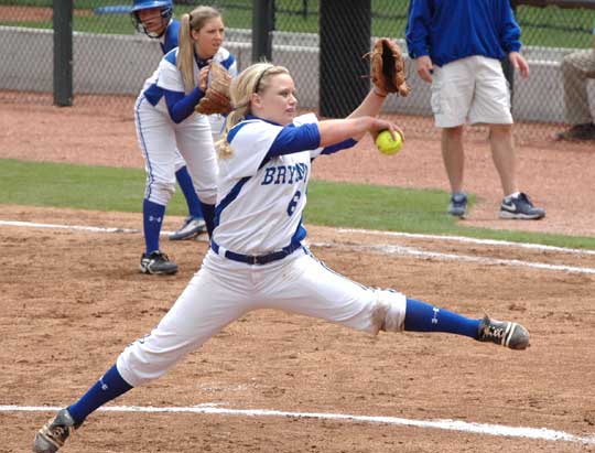 Peyton Jenkins delivers a pitch as Kayla Sory sets up defensively at first base during a game last season. (Photo by Mark Hart)