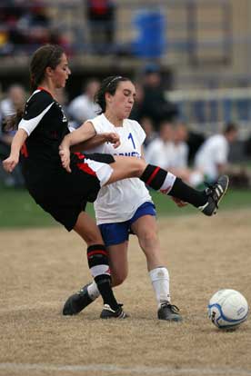 Bryant's Lexie Balisterri (1) battles with a Russellville player for control of the ball during Tuesday night's game. (Photo by Rick Nation)