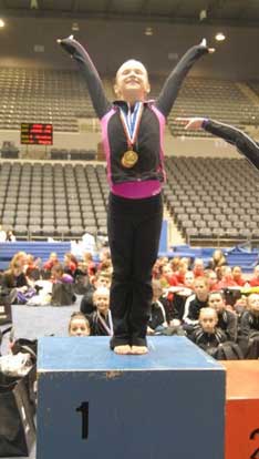 Deborah Shaw celebrates her State championship.